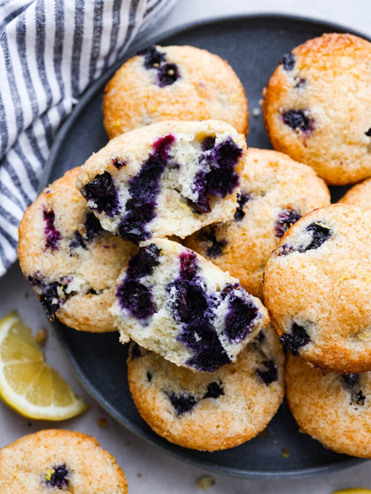 Closeup of a lemon blueberry muffin torn in half.