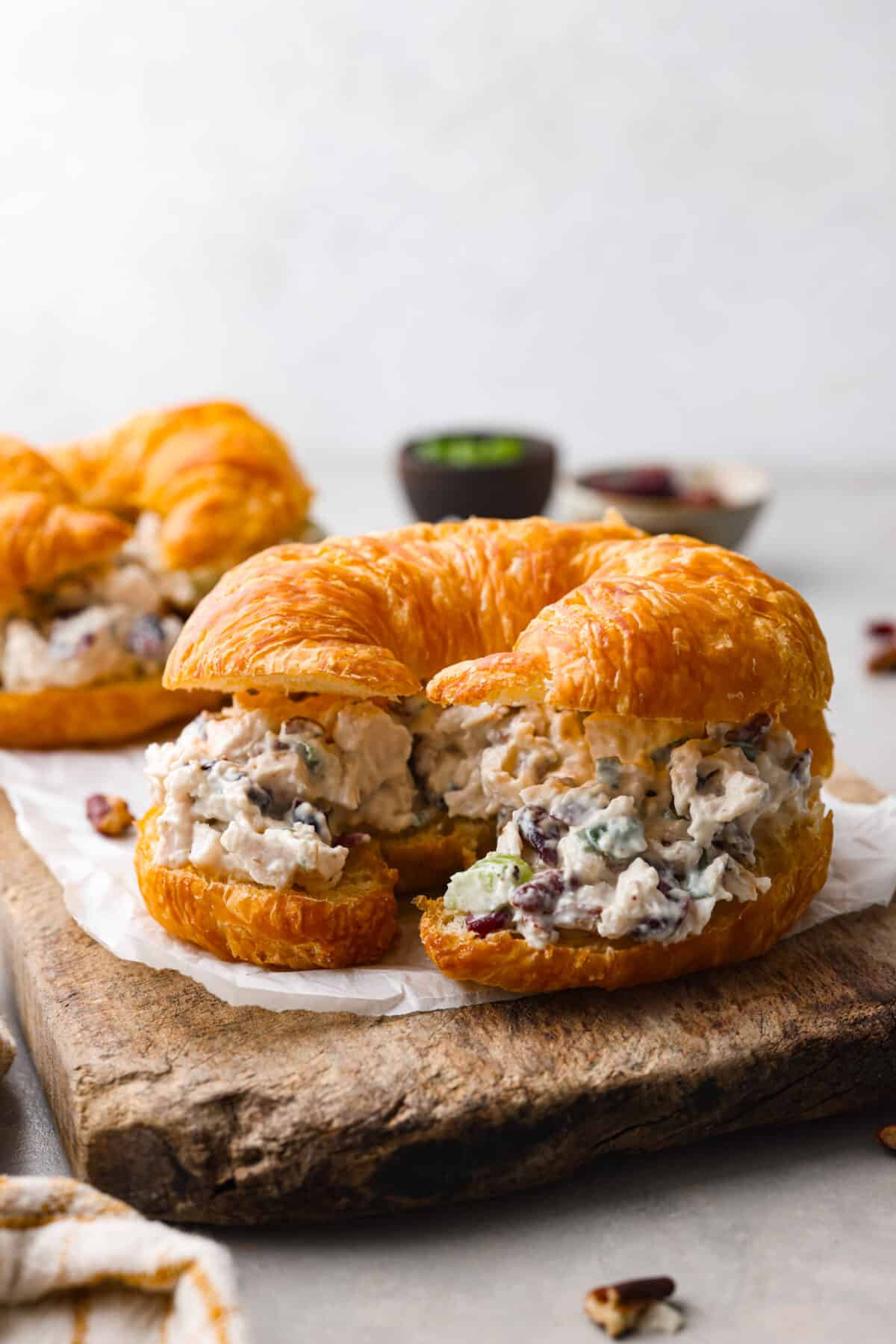 A croissant filled with turkey salad.