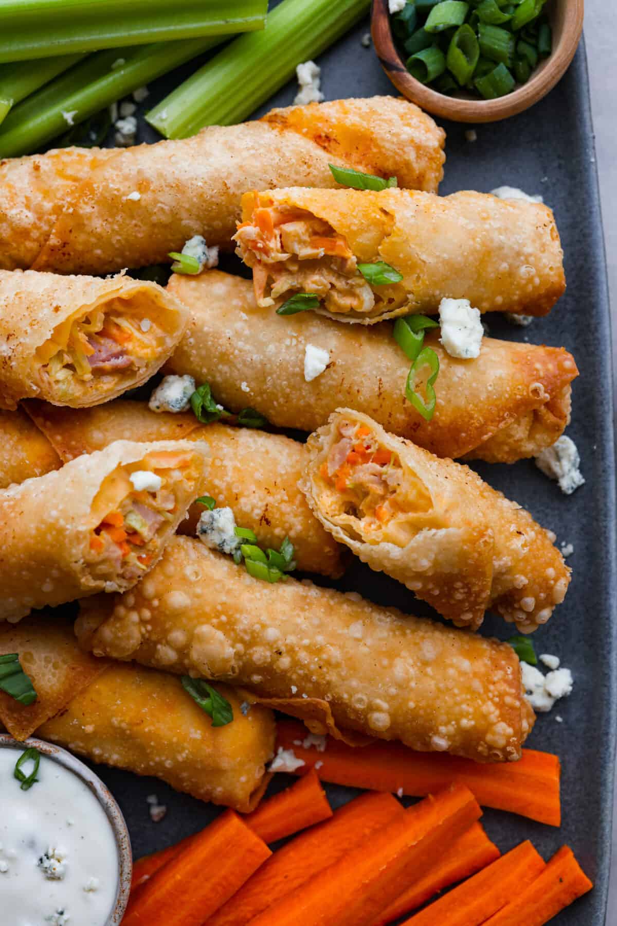 Buffalo Chicken Egg Rolls on a platter. 