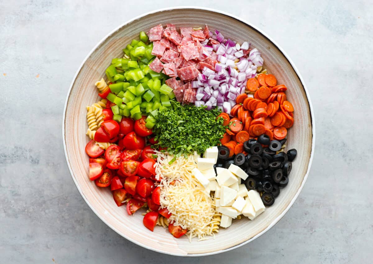 Overhead shot of large bowl with ingredients separated into piles.