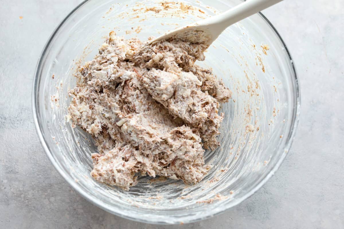 Overhead shot of brisket and cream cheese mixture in glass bowl 